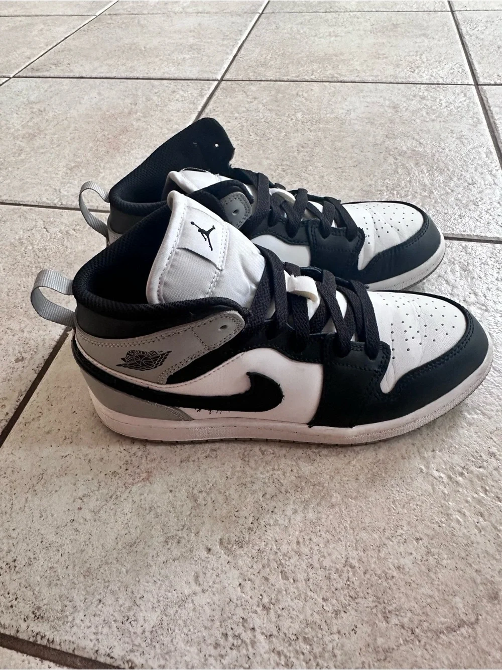 Air Jordan 1 Kids Black and White Low-Top Sneakers